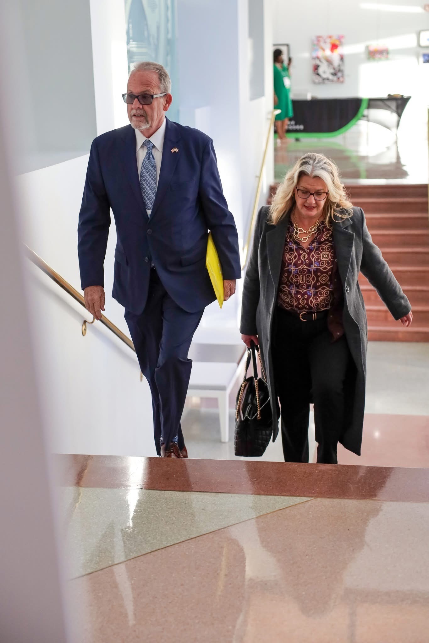 Vice Mayor Tom Reid walking up the stairs 